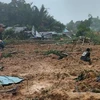 Hiện trường vụ lở đất tại Natuna, tỉnh Riau, Indonesia. (Ảnh: AFP/TTXVN)