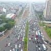 Khu vực Cổ Linh-Đàm Quang Trung sẽ được tổ chức lại giao thông nhằm tránh ùn tắc kéo dài tại đường Cổ Linh hướng lên cầu Vĩnh Tuy vào trung tâm nội thành. (Ảnh: Minh Đức/TTXVN)