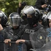 Cảnh sát Tunisia gác tại một chốt kiểm soát ở thủ đô Tunis. (Ảnh: AFP/TTXVN)