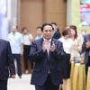 Thủ tướng Phạm Minh Chính đến dự Hội nghị công bố và triển khai Quy hoạch tổng thể quốc gia thời kỳ 2021-2030. (Ảnh: Dương Giang/TTXVN)