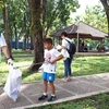 Trẻ em tham gia các hoạt động tại công viên 23/9. (Ảnh: Xuân Khu/TTXVN)