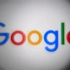 Biểu tượng Google trên một màn hình điện thoại. (Ảnh: AFP/TTXVN)