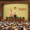 Phó Chủ tịch Quốc hội Trần Quang Phương phát biểu điều hành phiên họp ngày 23/6. (Ảnh: Doãn Tấn/TTXVN)