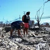 Nhiều ngôi nhà bị thiêu rụi trong thảm họa cháy rừng tại Lahaina, phía Tây đảo Maui, Hawaii, Mỹ. (Ảnh: AFP/TTXVN)