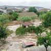 Cảnh ngập lụt do mưa lớn tại Volos, Hy Lạp. (Ảnh: AFP/TTXVN) 
