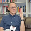 Tiến sỹ Tomotaka Shoji, Giám đốc Ban nghiên cứu Khu vực thuộc Viện Nghiên cứu Quốc phòng (NIDS) của Bộ Quốc phòng Nhật Bản, trả lời phỏng vấn của phóng viên TTXVN. (Ảnh: Nguyễn Tuyến/TTXVN)