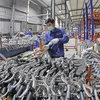 Sản xuất xe đạp tại Công ty Cổ phần Thống Nhất. (Ảnh: Trần Việt/TTXVN)