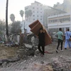 Cảnh tàn phá sau vụ không kích của Israel vào bệnh viện Al-Ahli ở Dải Gaza. (Ảnh: THX/TTXVN)