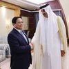 Thủ tướng Phạm Minh Chính gặp Quốc vương Qatar Tamim bin Hamad Al Thani. (Ảnh: Dương Giang/TTXVN)