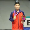 Xạ thủ Phạm Quang Huy giành huy chương Vàng tại ASIAD 2023. (Ảnh: TTXVN phát)
