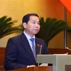 Chủ nhiệm Ủy ban Tài chính, Ngân sách của Quốc hội Lê Quang Mạnh trình bày Báo cáo giải trình, tiếp thu, chỉnh lý dự thảo Nghị quyết về Phương án Phân bổ Ngân sách Trung ương năm 2024. (Ảnh: Văn Điệp/TTXVN)