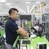 Công nhân Công ty TNHH Samsung Electronics Việt Nam, khu công nghiệp Yên Phong, tỉnh Bắc Ninh trong ca làm việc. (Ảnh: Thanh Thương/TTXVN) 