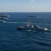 Tàu chiến tham gia cuộc tập trận chung Mỹ-Nhật Bản-Hàn Quốc ở vùng biển phía Nam Bán đảo Triều Tiên ngày 17/1. (Ảnh: Yonhap/TTXVN)