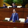 Bộ trưởng Bộ Ngoại giao Bùi Thanh Sơn trả lời chất vấn của đại biểu Quốc hội. (Ảnh: Phạm Kiên/TTXVN)