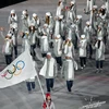 Đoàn vận động viên Ủy ban Olympic Nga diễu hành tại lễ khai mạc Thế vận hội mùa Đông Pyeongchang 2018 ở Hàn Quốc. (Ảnh: AFP/TTXVN)