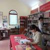 Duy trì hoạt động tại Thư viện cộng đồng tại Hà Nội. (Ảnh: Đinh Thuận/TTXVN)
