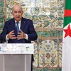 Tổng thống Algeria Abdelmadjid Tebboune tại một cuộc họp báo ở thủ đô Algiers. (Ảnh: AFP/TTXVN)