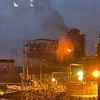 Nhà máy lọc dầu Taneco bốc cháy sau khi bị UAV tấn công. (Ảnh: RIA Novosti)
