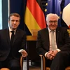 Tổng thống Pháp Emmanuel Macron (trái) và Tổng thống Đức Frank-Walter Steinmeier tại cuộc gặp ở Strasbourg, Pháp, ngày 2/12/2021. (Ảnh: AFP/ TTXVN)