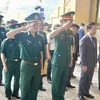 Đại diện Ban Chỉ đạo 515 tỉnh Quảng Bình và Ban Công tác đặc biệt tỉnh Khammouan mặc niệm tưởng nhớ các anh hùng liệt sỹ. (Nguồn: Báo Quảng Bình)