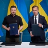 Tổng thống Ukraine Volodymyr Zelensky và Thủ tướng Thụy Điển Ulf Kristersson tại lễ ký kết thỏa thuận. (Nguồn: Telegram)