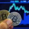 Hình ảnh mô phỏng đồng tiền điện tử Bitcoin. (Ảnh: AFP/TTXVN)
