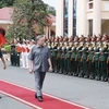 Chủ tịch nước Tô Lâm duyệt Đội danh dự. (Ảnh: Nhan Sáng/TTXVN)