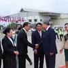 Lễ đón Chủ tịch nước Tô Lâm tại Sân bay quốc tế Wattay. (Ảnh: Nhan Sáng/TTXVN)