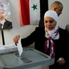 Người dân Syria đi bỏ phiếu bầu Quốc hội khóa mới. (Nguồn: Reuters)