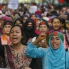 Người dân tham gia biểu tình phản đối chế độ hạn ngạch việc làm nhà nước tại Dhaka, Bangladesh. (Ảnh: Getty Images/TTXVN)