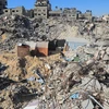 Các tòa nhà bị phá hủy do xung đột Hamas-Israel tại Khan Younis, Dải Gaza. (Ảnh: THX/TTXVN)
