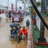 Ngập lụt do mưa lớn gây ra bởi bão Yagi ở tỉnh Rizal, Philippines ngày 2/9. (Ảnh: THX/TTXVN)