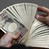 Đồng tiền mệnh giá 10.000 yen Nhật Bản. (Ảnh: AFP/TTXVN)