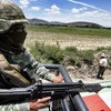 Binh sỹ quân đội Mexico tuần tra ở Tepeaca, bang Puebla, Mexico. (Ảnh; AFP/TTXVN)