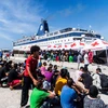 Người di cư tại đảo Lampedusa, Italy. (Ảnh: AFP/TTXVN)