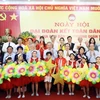 Tổng Bí thư Tô Lâm, Chủ tịch Quốc hội Trần Thanh Mẫn với cán bộ, nhân dân Phường Quán Thánh, Quận Ba Đình, Hà Nội. (Ảnh: Thống Nhất/TTXVN)