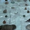 Các hiện vật được tìm thấy tại một di chỉ khảo cổ. (Ảnh minh họa: Thanh Bình/TTXVN)