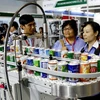Triển lãm chuyên ngành về đóng gói, chế biến thực phẩm và đồ uống năm 2013 (ProPak Vietnam 2013). (Ảnh: Thế Anh/TTXVN) 