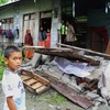 Một ngôi nhà bị phá hủy do động đất ở tỉnh Aceh, Indonesia. (Ảnh: AFP/TTXVN)