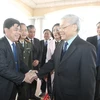 Tổng Bí thư Nguyễn Phú Trọng với các vị lãnh đạo chủ chốt tỉnh Ninh Bình. (Ảnh: Trí Dũng/TTXVN)