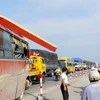 Tại nạn giao thông giữa một xe khách và một xe tải tại xã Cam Tân, huyện Cam Lâm, tỉnh Khánh Hòa. (Ảnh: Tiên Minh/TTXVN)