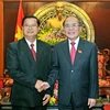 Chủ tịch Quốc hội Nguyễn Sinh Hùng tiếp Phó Chủ tịch Quốc hội CHDCND Lào Somphan Phenkhamy sang thăm và làm việc tại Việt Nam. (Ảnh: Nhan Sáng/TTXVN)