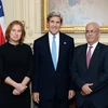 Ngoại trưởng Mỹ (giữa), Bộ trưởng Tư pháp Israel (trái) và Trưởng đoàn đàm phán Palestine tại Washington, DC, ngày 29/7 năm ngoái. (Ảnh: AFP/TTXVN)