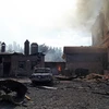Hiện trường đổ nát sau các vụ xung đột giữa người biểu tình và quân đội Ukraine tại Slavyansk, đông nam Ukraine ngày 8/6 vừa qua. (Ảnh: AFP/TTXVN)