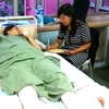 Ban liên lạc Cộng đồng giúp đỡ 1 phụ nữ Việt bị tai nạn tại Malaysia