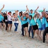 Các bạn trẻ hào hứng tham gia các hoạt động tại ngày hội du lịch biển Đà Nẵng. (Ảnh minh họa: Trần Lê Lâm/TTXVN)