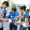 Tình nguyện viên tại kỳ thi vào Đại học Quốc gia Hà Nội. (Ảnh minh họa: Minh Sơn/Vietnam+)