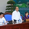 Phó Thủ tướng Nguyễn Xuân Phúc, Chủ tịch Ủy ban an toàn giao thông Quốc gia chủ trì Hội nghị trực tuyến công tác bảo đảm trật tự an toàn giao thông 6 tháng đầu năm 2015. (Ảnh: Doãn Tấn/TTXVN)