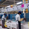 Công nhân Ấn Độ đang làm việc trong nhà máy. (Nguồn: www.livemint.com)