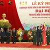 Chủ tịch nước Trương Tấn Sang trao tặng Huân chương Hồ Chí Minh cho ngành Tòa án Nhân dân. (Ảnh: Nguyễn Khang/TTXVN)